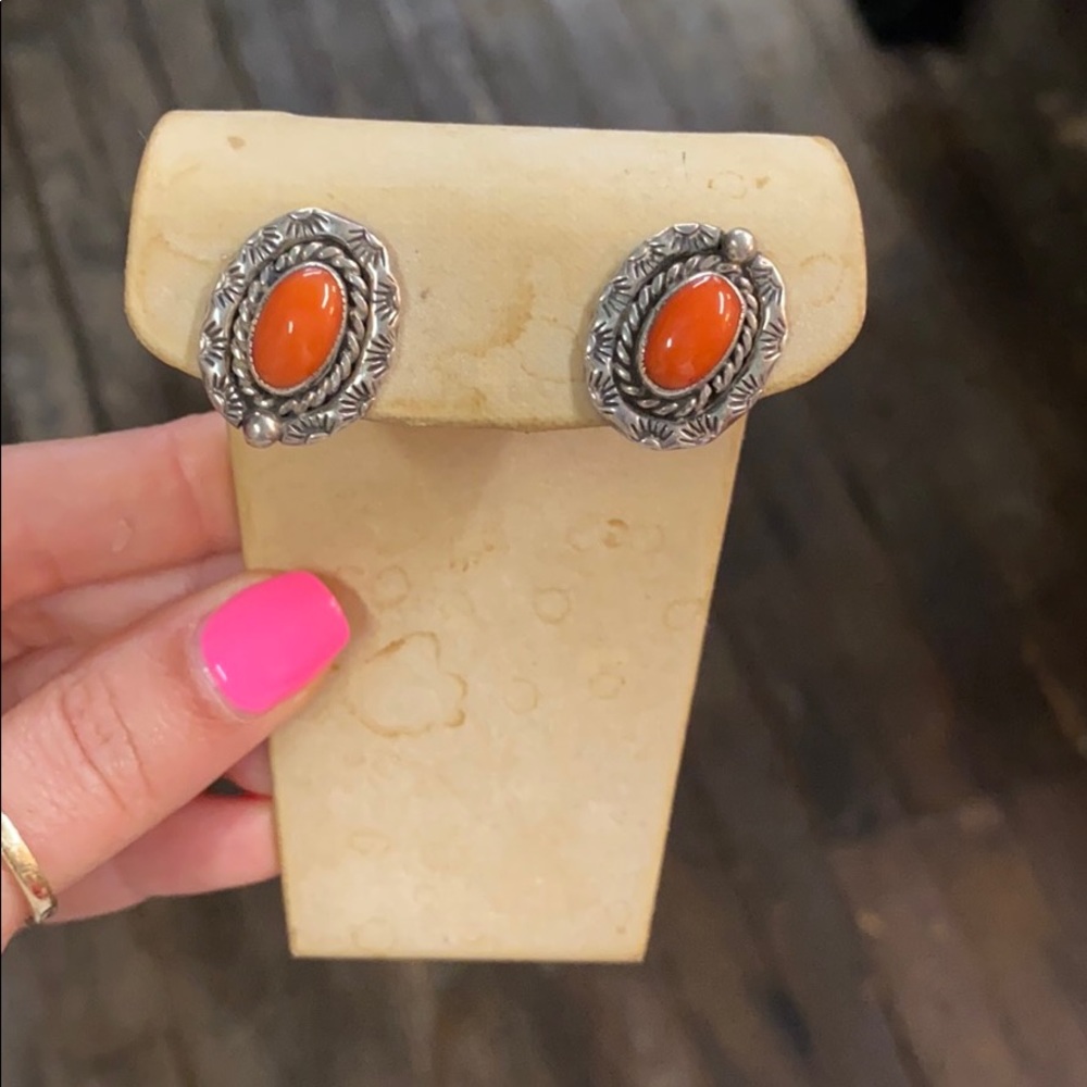 Sterling silver earrings with orange stone